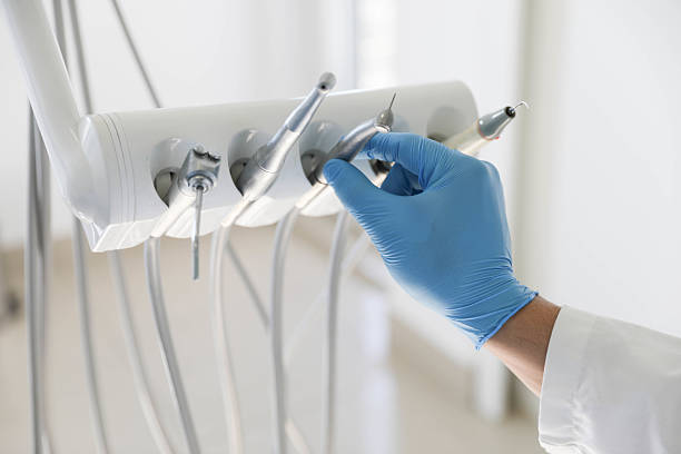 Professional Emergency Dentist technician working in Grayson, CA